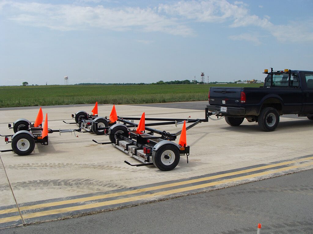 Good for picking up debris at airports. Shown in use by the Air National Guard in West Virgina.