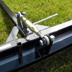 Barre de réglage insérée dans le tube supérieur pour ajuster la hauteur de l'aimant de balayage