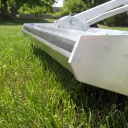 Angled nose feature for pushing through grass