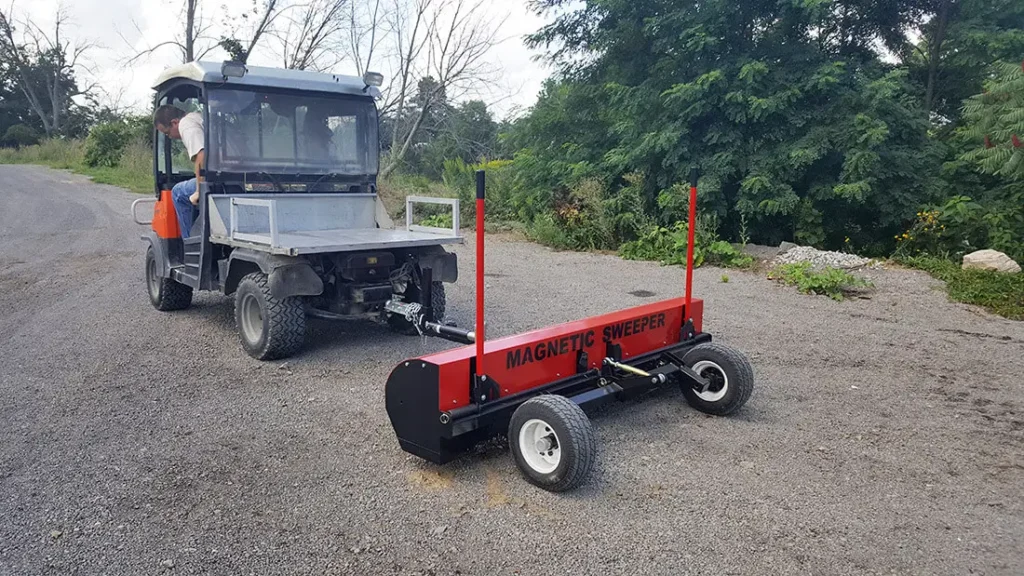 Fletchers Horse World farm sweeping for metal debris with Bluestreak Caiman tow behind magnetic sweeper