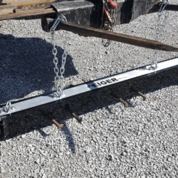 Backhoe loader front mounted magnetic sweeper - Eiger by Bluestreak Equipment