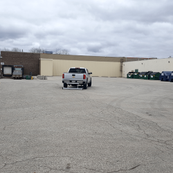 sweeping for metal debris mall parking lot PYR magnetic sweeper
