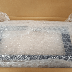 Naos steel mounting frame bubble wrapped in main box on top of 3 smaller parts boxes