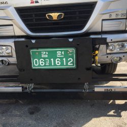 ISO hanging magnetic sweeper on South Korean highway maintenance truck