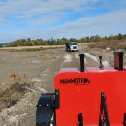 Access road cleaning and grooming trailer