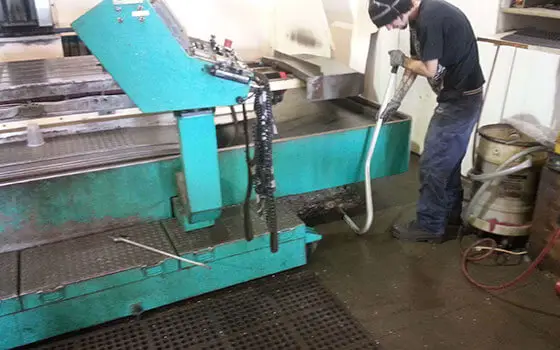 Powerstik In Use Under Machinery
