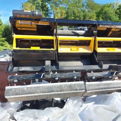 Meerkat track loader Magnetic sweeper debris cleanoff into dumpster