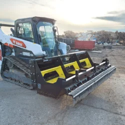 Barredora magnética Sokoke en cargadora sobre orugas