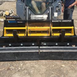 Track loader construction site magnetic sweeper by Bluestreak Equipment