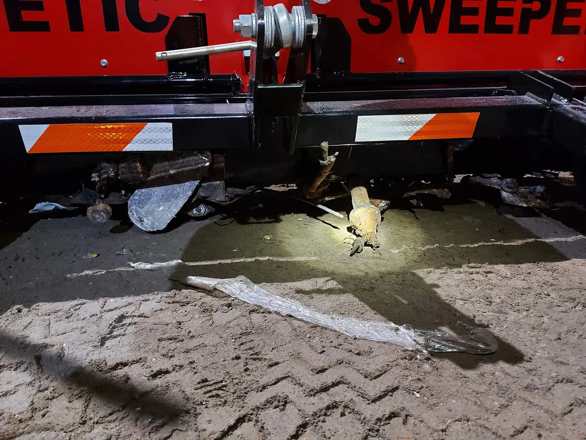 Mining tooth magnetic sweeper collection