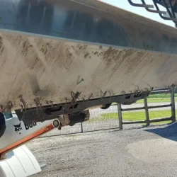 Aluminum debris Pan on Lynx Skidsteer Magnet