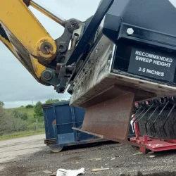 Skidsteer Magnet Picking Up IBeam