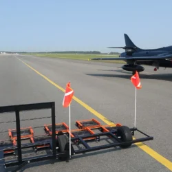 Hawk Hunter Aircraft on Apron with Seeker Airdrag Friction FOD Sweeper